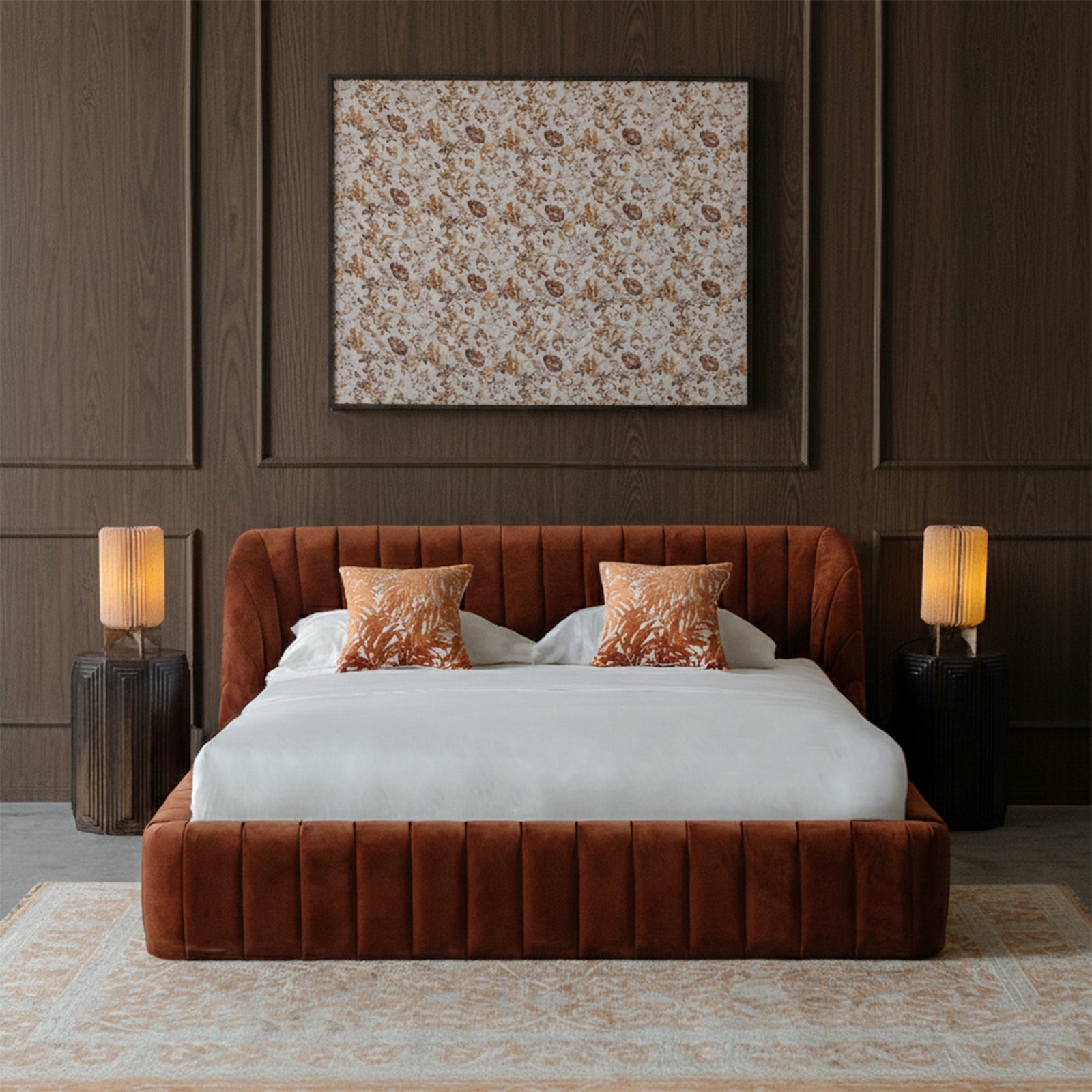 Modern bedroom with a brown upholstered bed, white bedding, and decorative pillows.