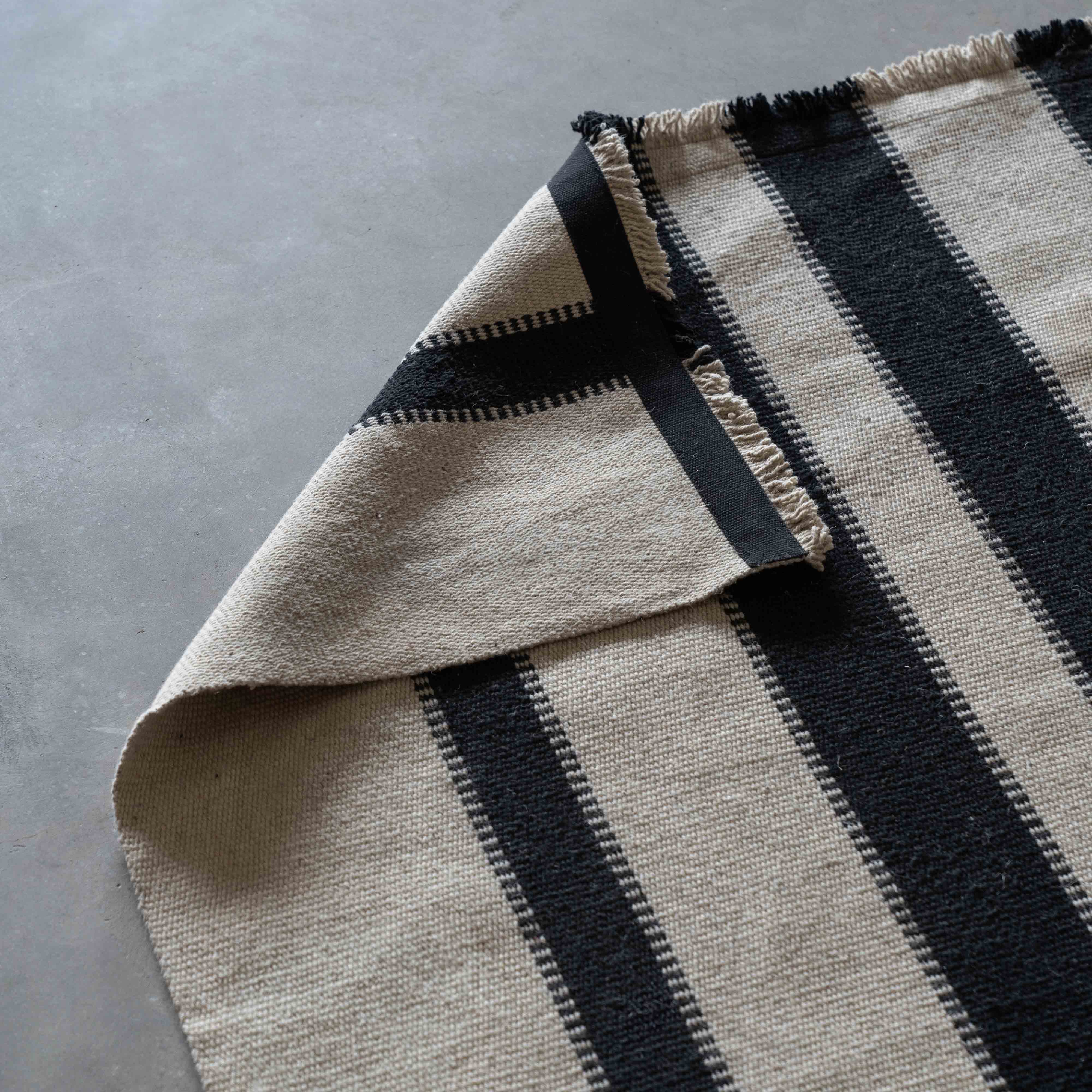 Nayef Handmade Beige & Black Wool Rug | Carpet - Rugs - WS Living - UAE Modern Home Furniture Stores in Dubai