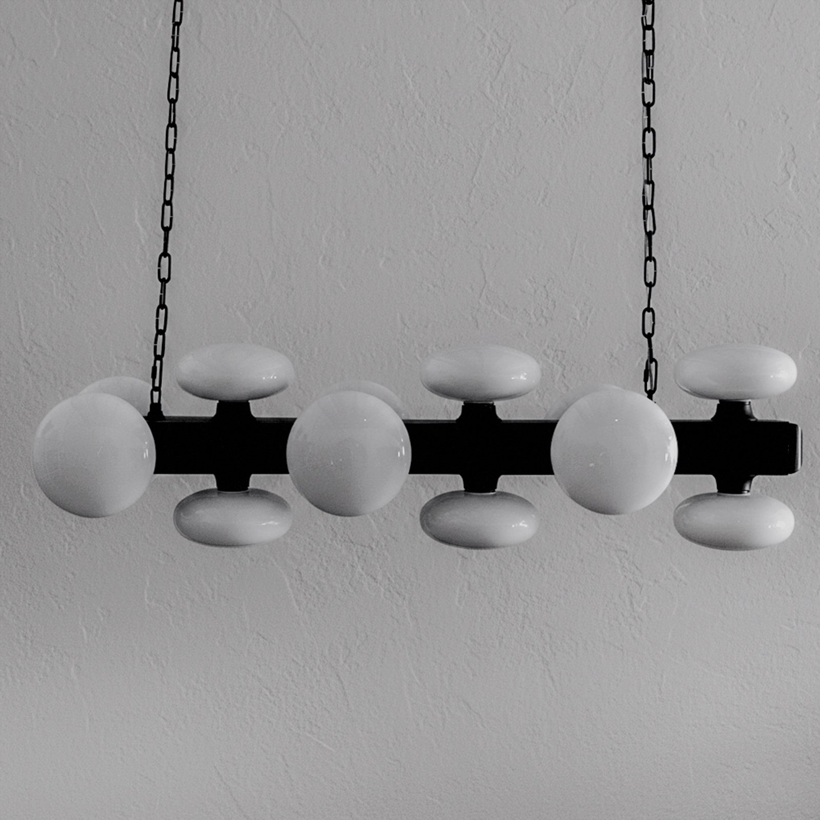 Modern chandelier with white spherical lights and black metal frame on a gray background