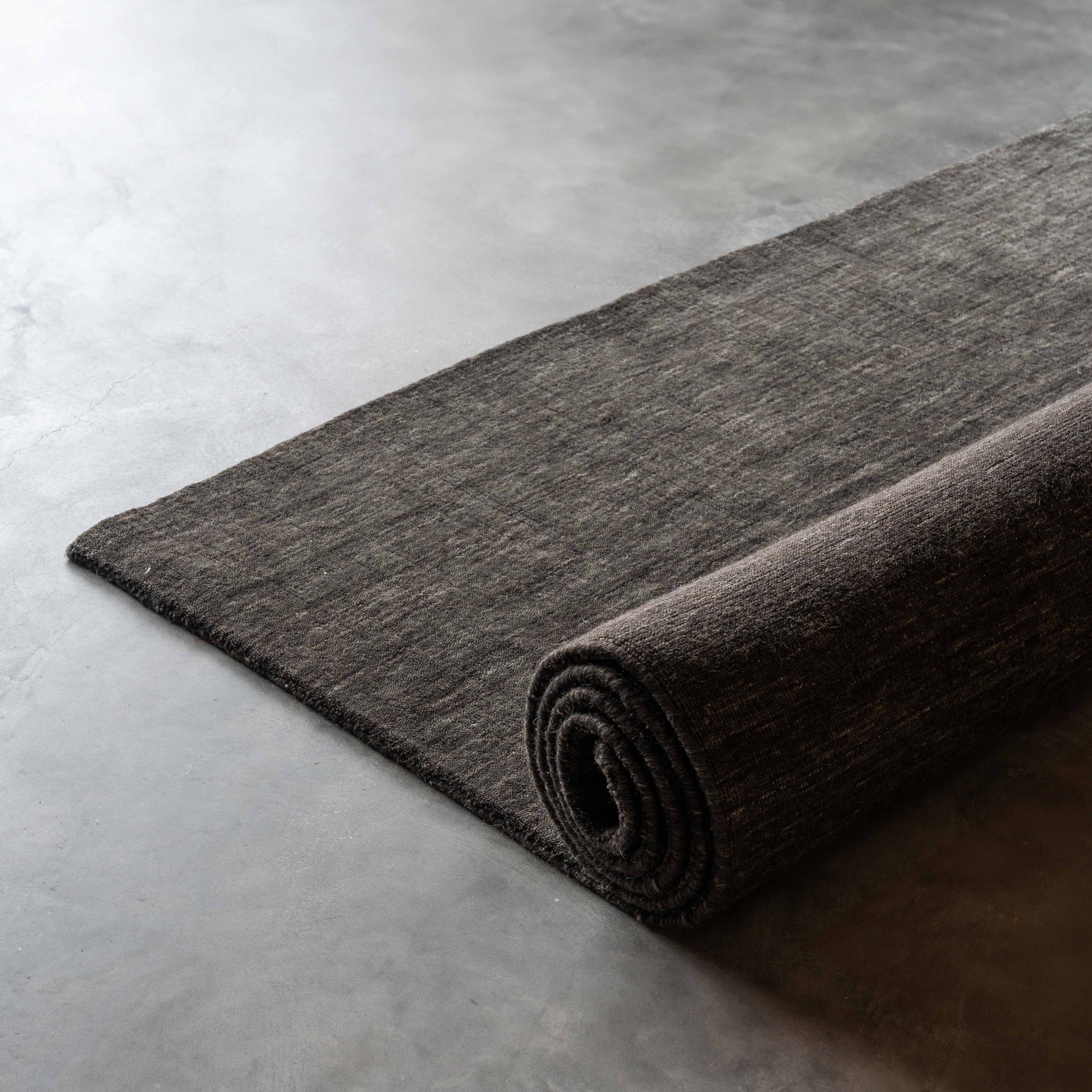 Aviral Handcrafted Black and Grey Wool Soft Rug