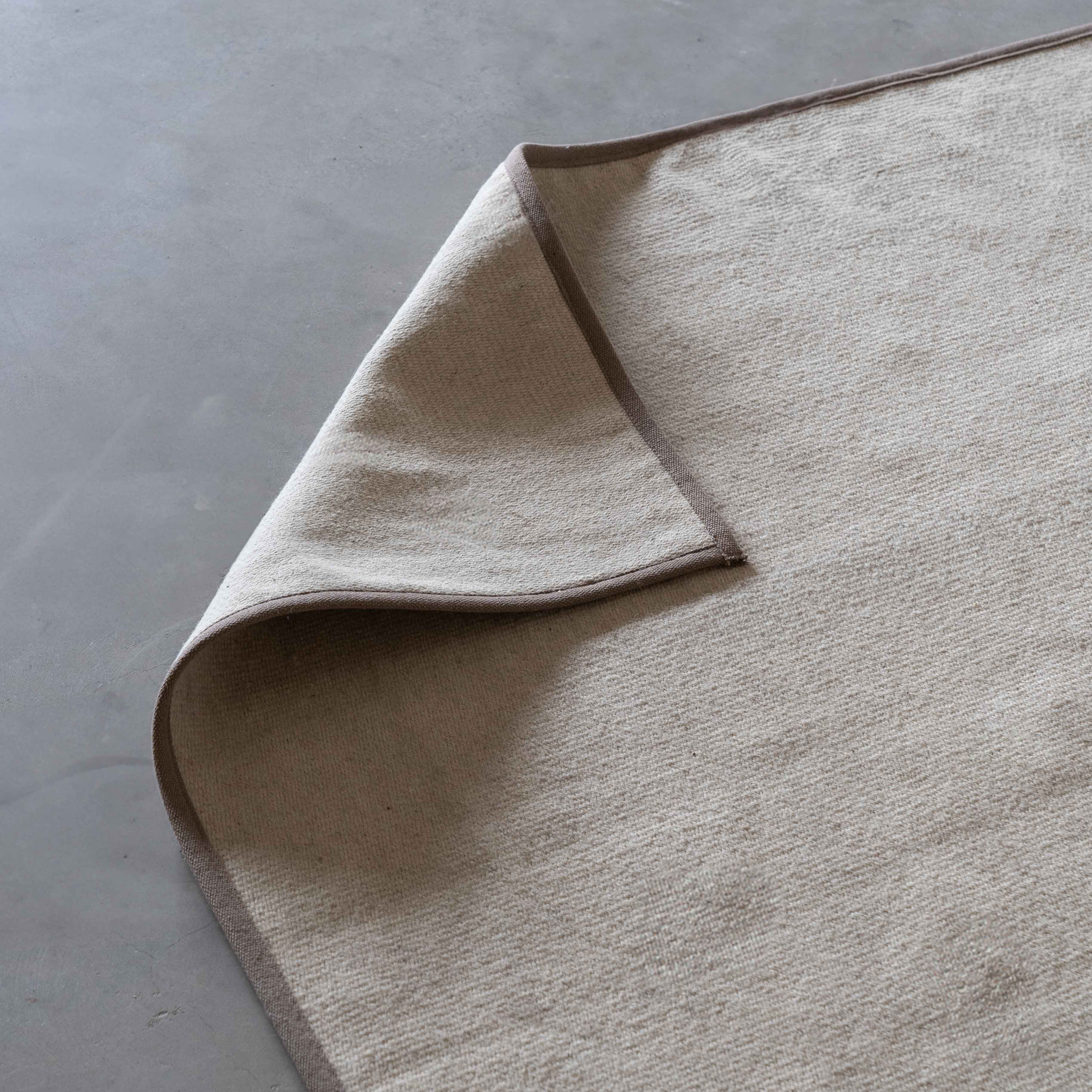 Afra Handmade Beige Wool Rug