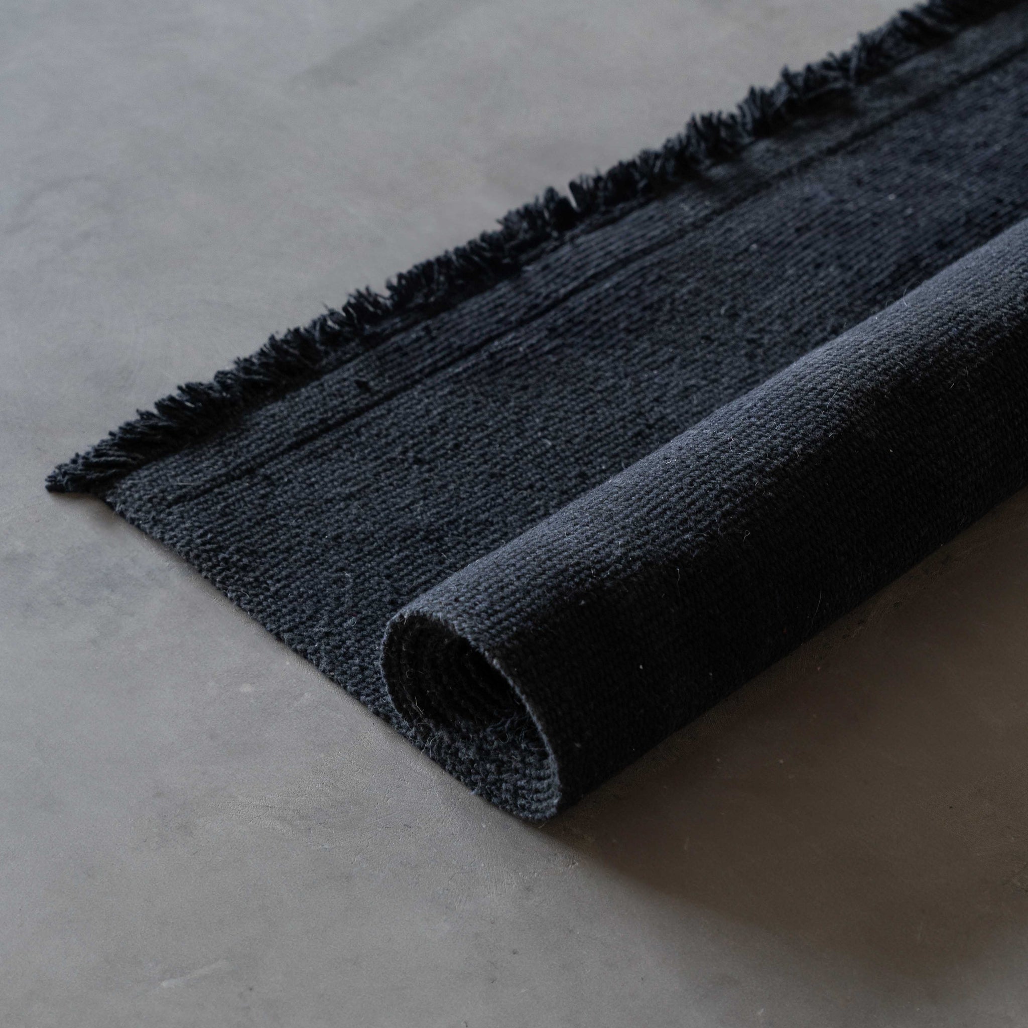 Nawaf Handmade Black Wool Rug | Rugs & Carpets | Ws living - UAE