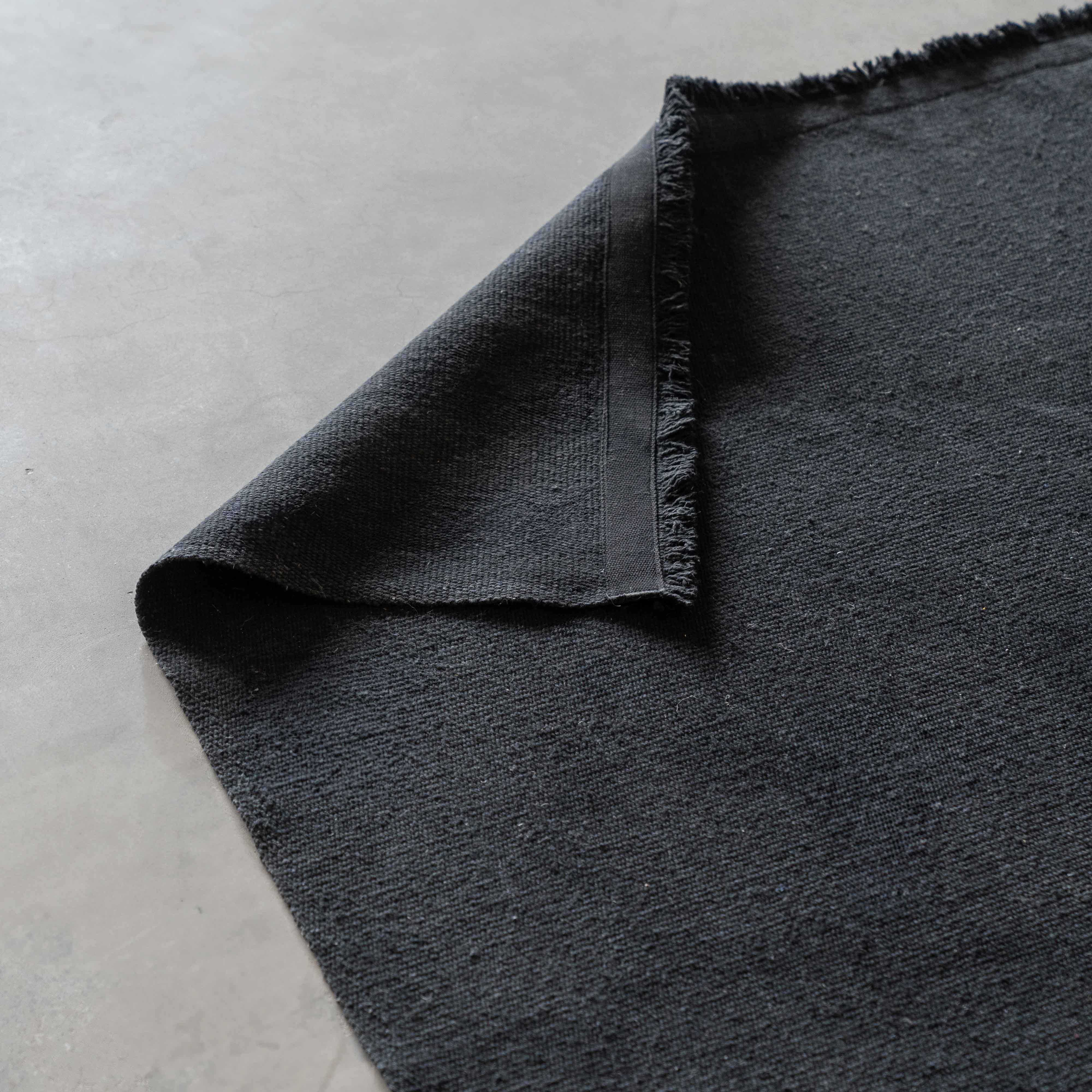 Nawaf Handmade Black Wool Rug